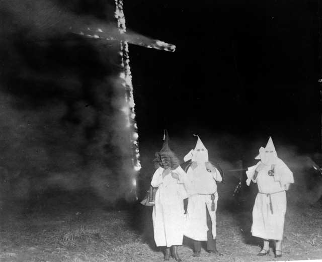 KKK members and a burning cross Denver Colorado 1921