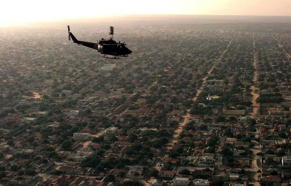 US Marine helicopter as it flies over a Mogadishu December 1992 TSGT Perry Heimer