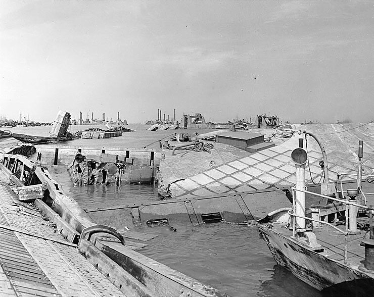 Wrecked pontoon causeway of one of the Mulberry artificial harbours following the storm of 1922 June 1944jpg